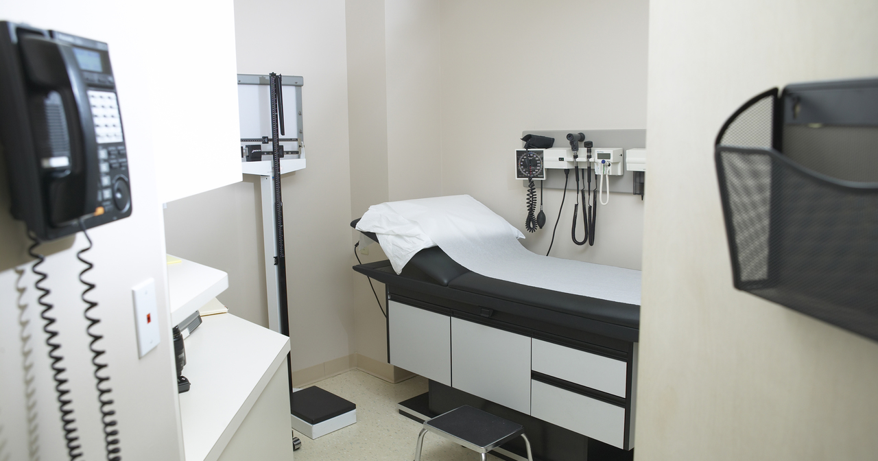 Examination table and scale in a doctor's office