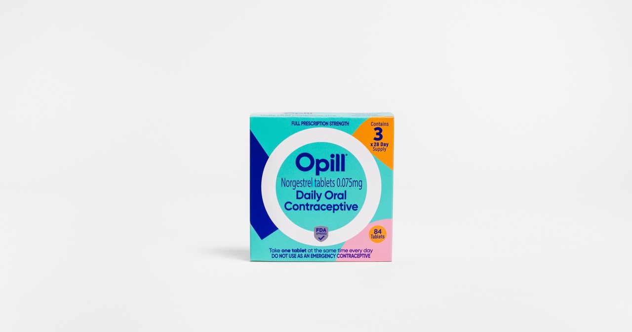 Bright blue and orange Opill Daily Oral Contraceptive box on a white background