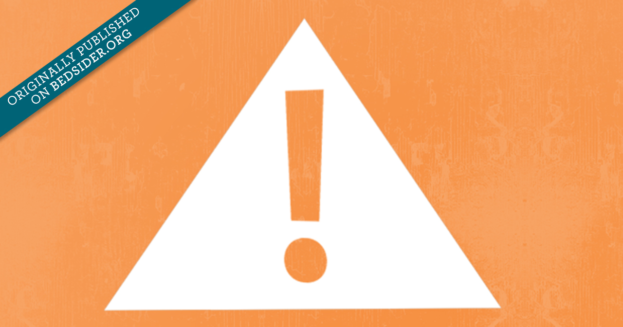A orange exclamation mark inside a white triangle